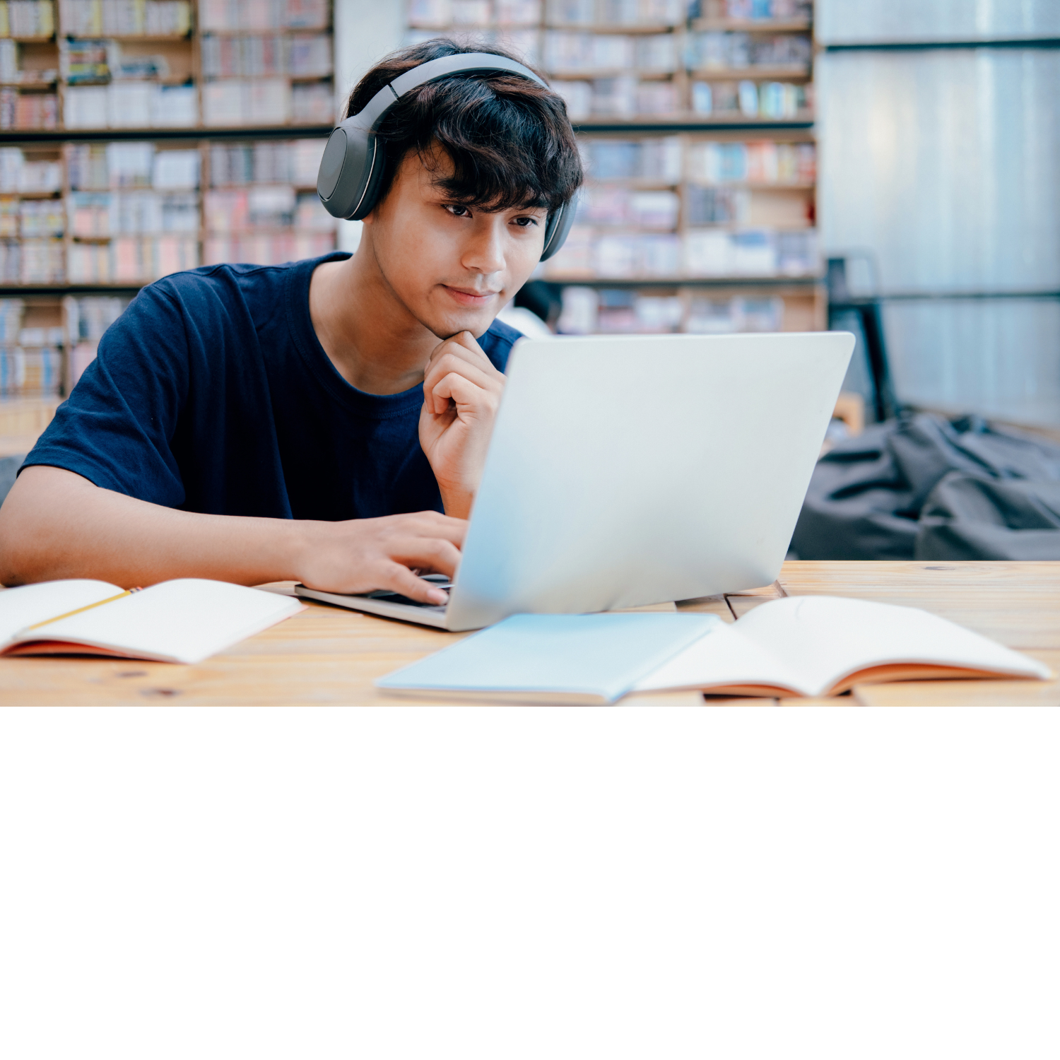 7th-10th grade student working on computer